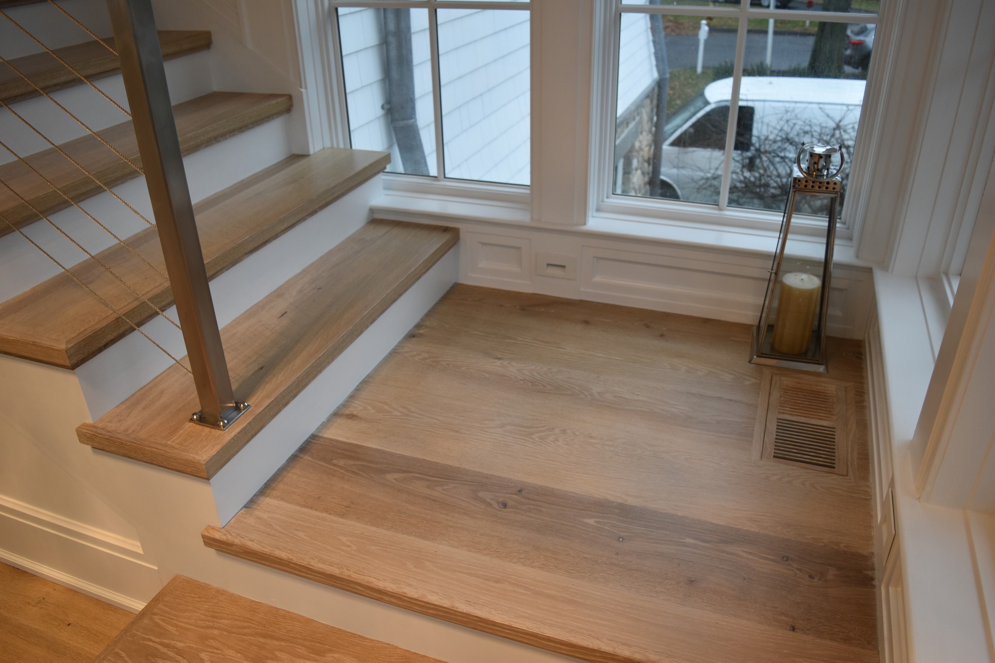 Close up of new hardwood flooring anf stairs